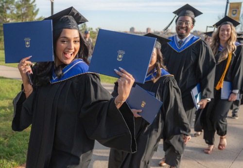 ULethbridge students in convocation gowns