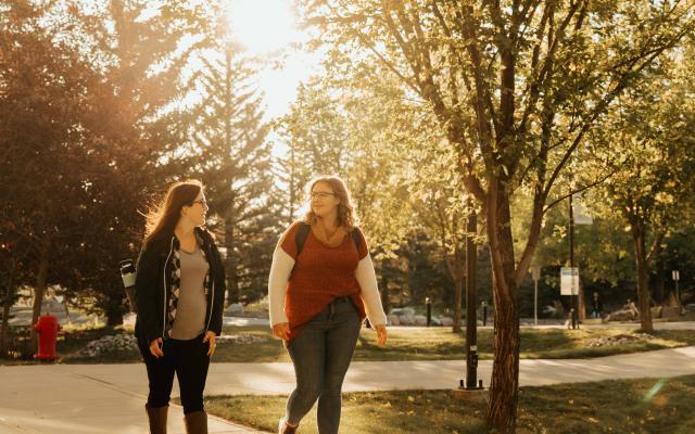 Students walking in Fall