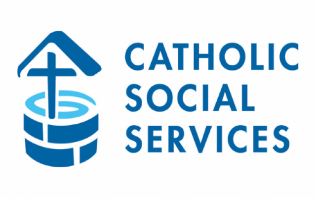 Catholic Social services Logo, blue well with a cross