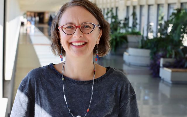 image of Petra Miller, smiling in Devonian walkway