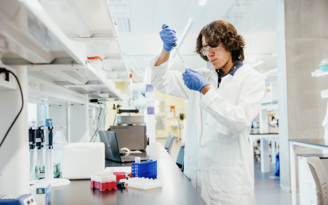 Student in a lab conducting scientific research