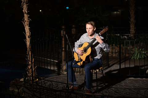 Guitarist playing at Abbondanza