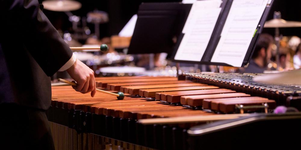 student playing xylophone