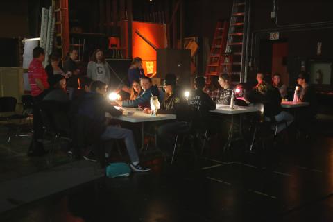 students working with lighting at tables