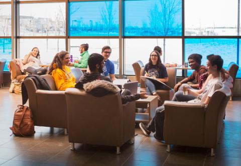 Students in the atrium of the Dhillon School of Business Students in the atrium of the Dhillon School of Business