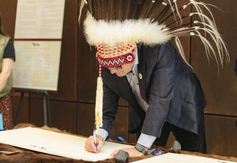 President & Vice-Chancellor Dr. Mike Mahon signing the Buffalo Treaty